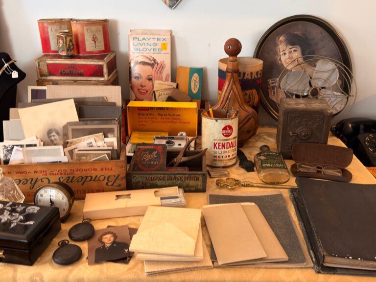 Vintage cameras, photographs, and tins discovered at a Nashville estate sale