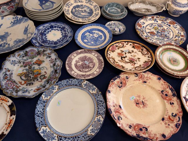 plates for sale at an estate sale